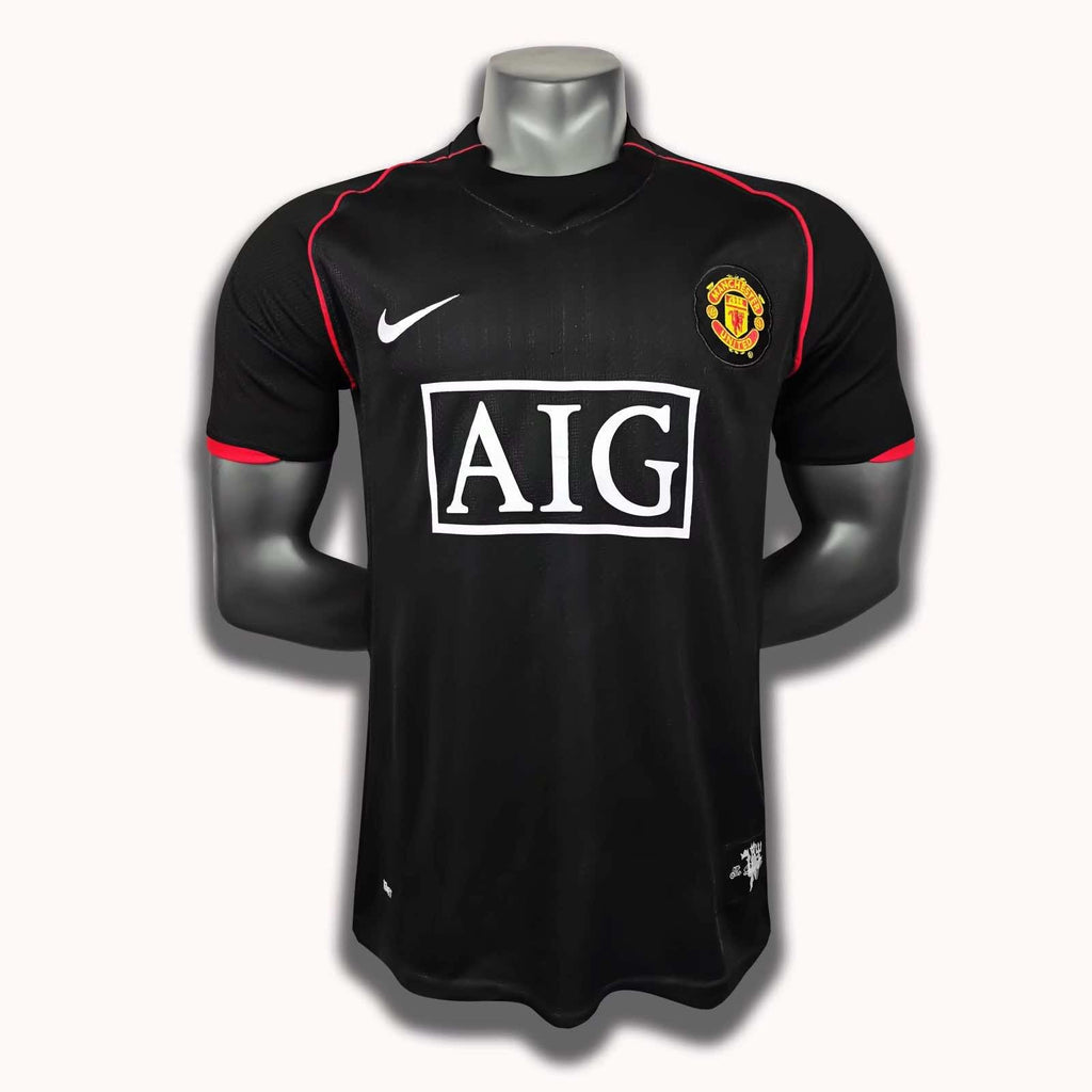 Manchester United BLACK AIG Short Sleeve Retro Football Jersey – Front View