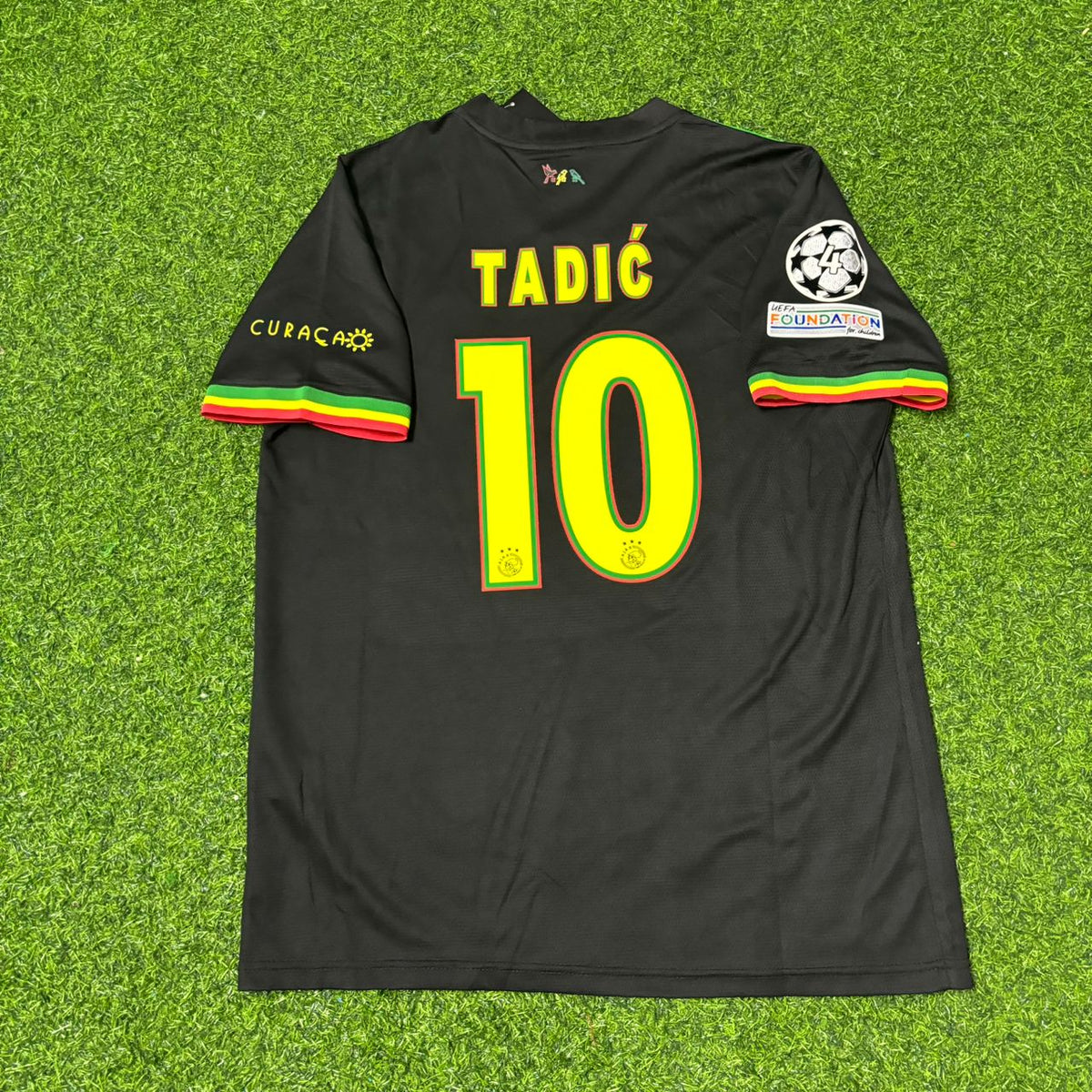 2021 Dušan Tadić Ajax 2022 Black Bob Marley Edition Retro Football Jersey – Back View