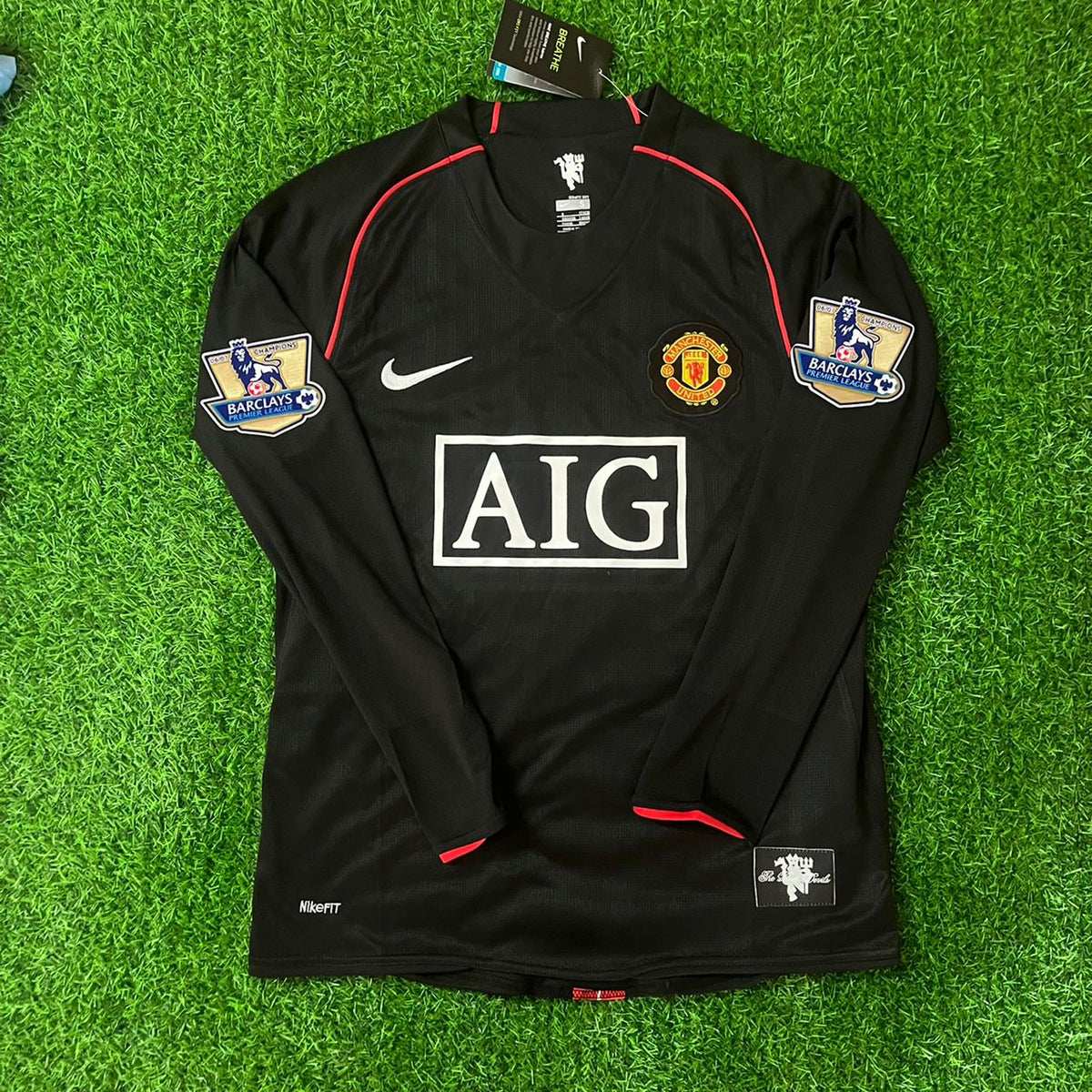 Patrice Evra 2007-2008 Manchester United Black Retro Jersey – Front View