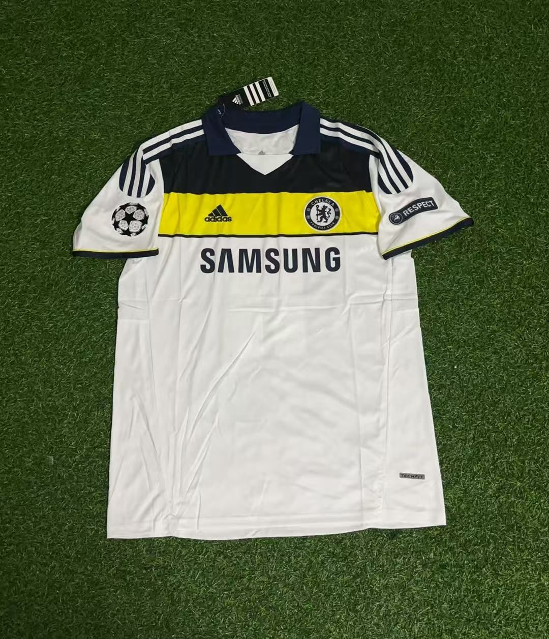 2011 Didier Drogba 11 - Chelsea 2012 CL White Yellow Retro Football Jersey – Front View