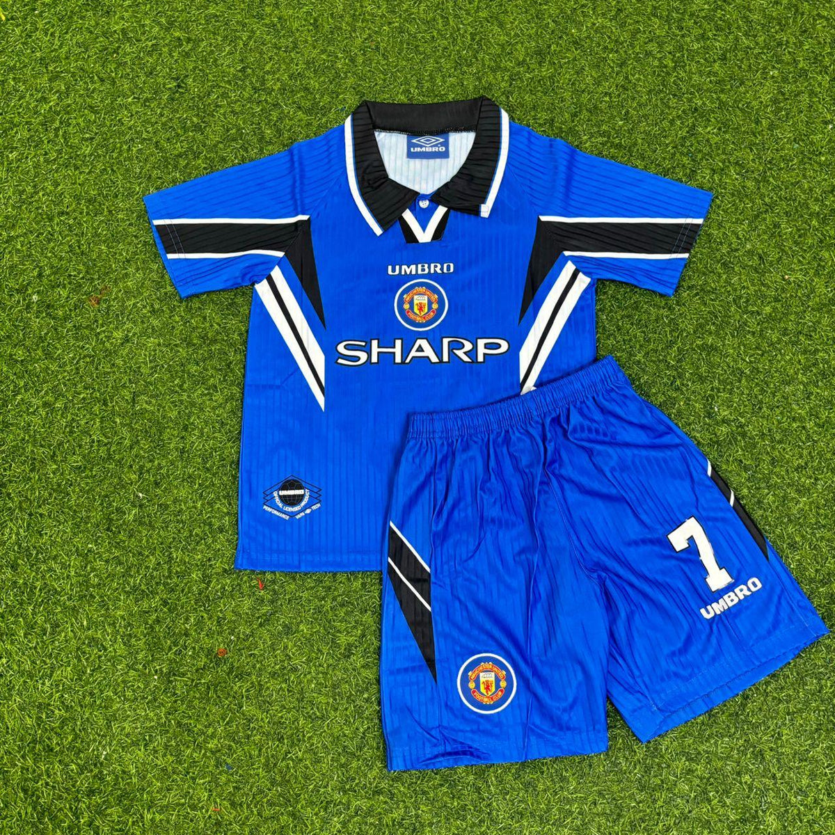 Eric Cantona Manchester United 1996/97 Blue Kids Retro Football Jersey – Front View