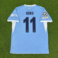 Jeremy Doku #11 Manchester City 2026-27 Home New Season Champions League Patch Jersey – Back View