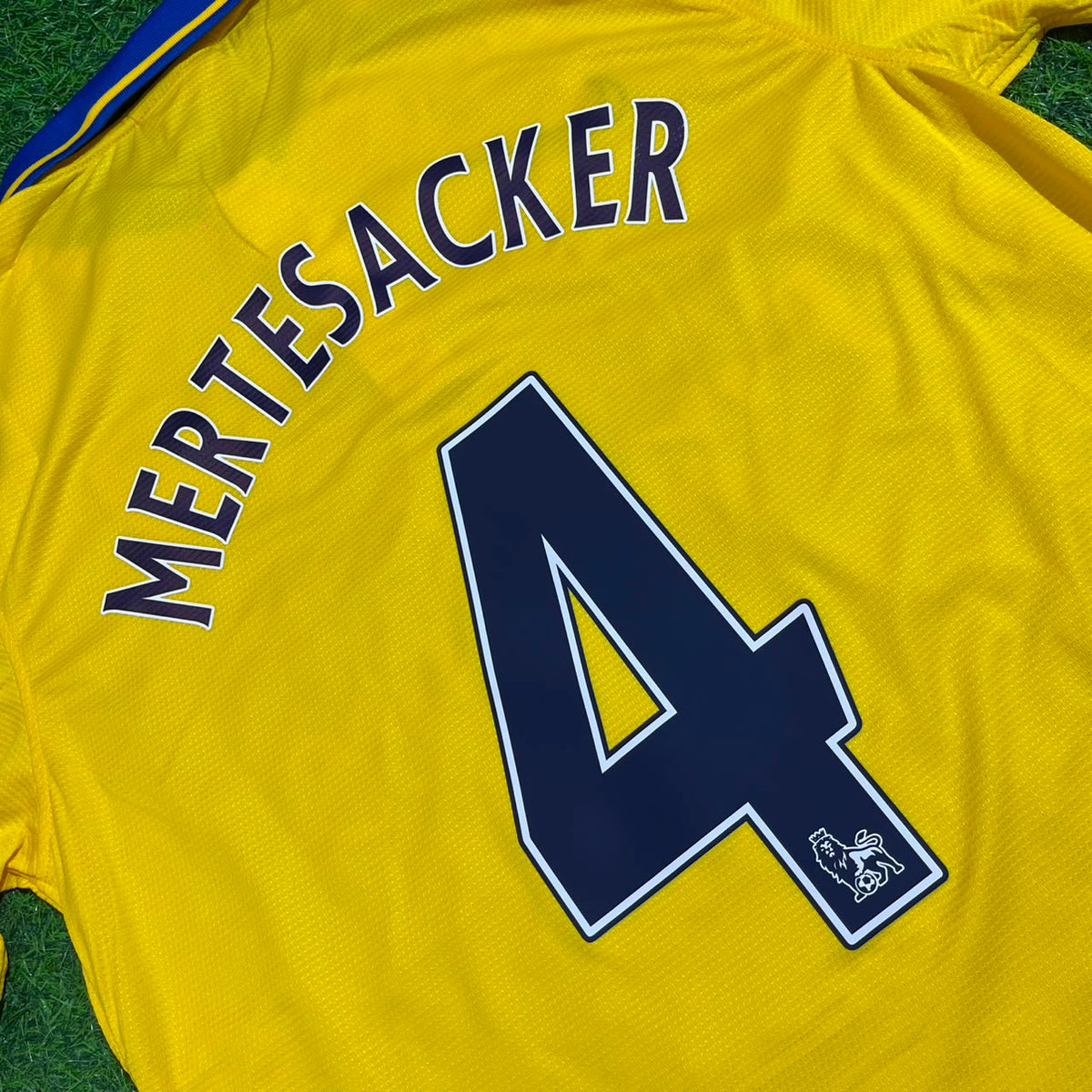 Per Mertesacker – Arsenal 2013/2014 Yellow Retro Kit Jersey – Detailed View
