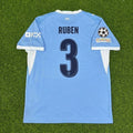 Ruben Dias #3 Manchester City 2026-27 Home New Season Champions League Patch Jersey – Back View